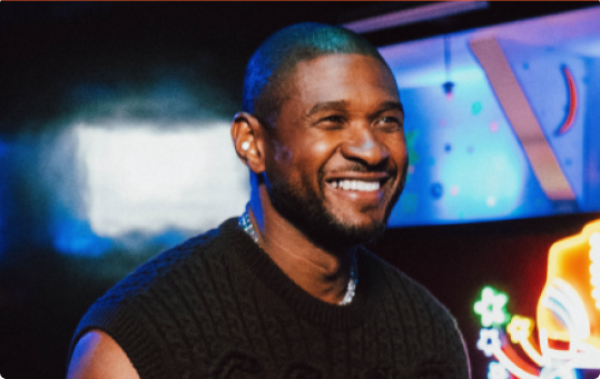 Usher smiling